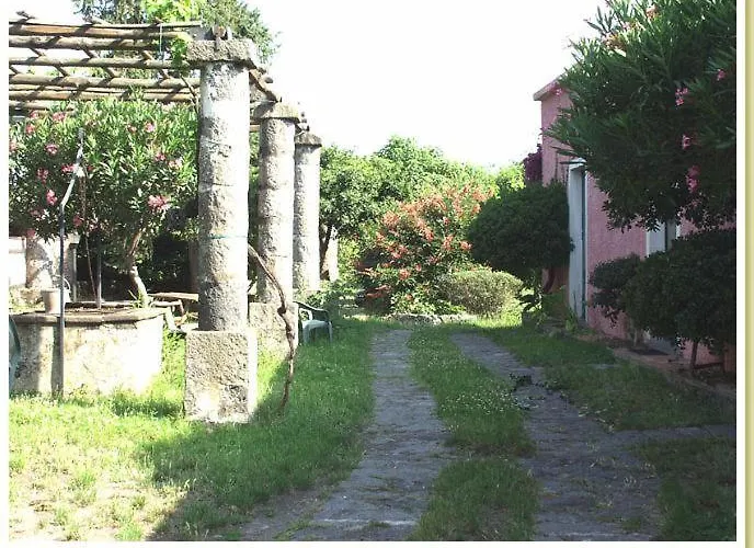 Апартаменты Codavolpe Giardino Di Tea