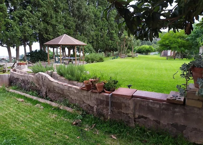Апартаменты Codavolpe Giardino Di Tea *